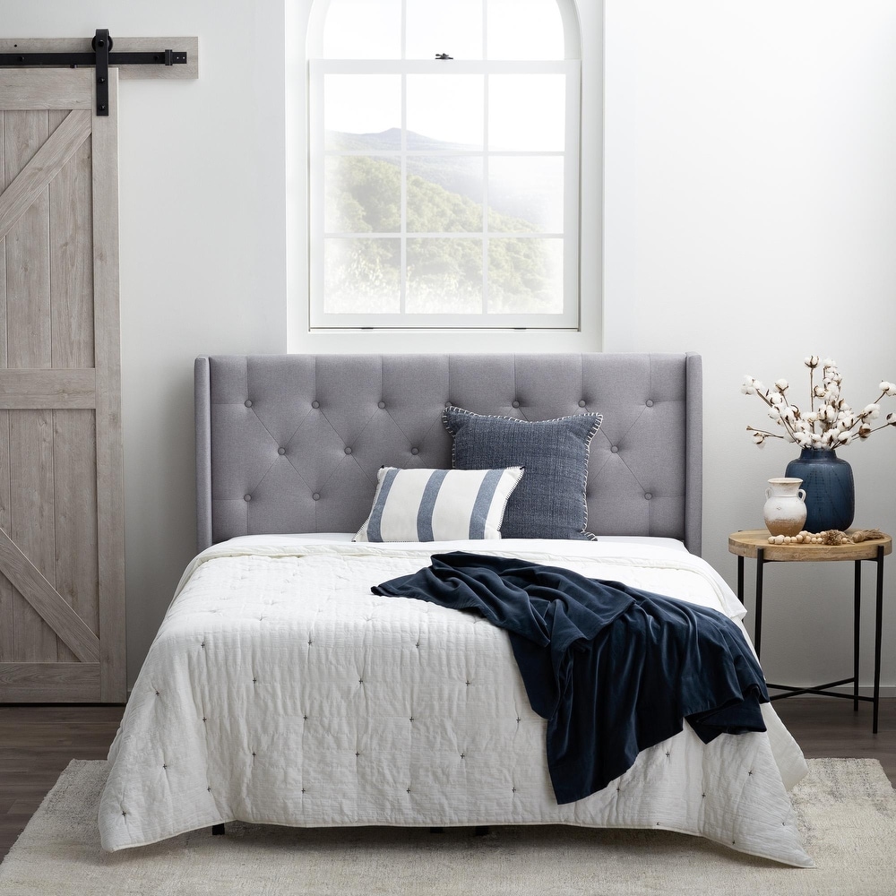 Bourgeois upholstered store wingback headboard